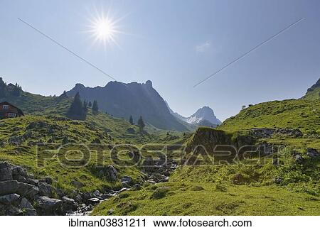 "Laguz Bach stream and Rote Wand Mountain, seen from the Laguz Alps, Grosses Walsertal Biosphere Reserve, Vorarlberg, Austria, Europe" View Large Photo Image Stock Image - "Laguz Bach stream and Rote Wand Mountain, seen from the Laguz Alps, Grosses Walsertal Biosphere Reserve, Vorarlberg, Austria, Europe". Fotosearch