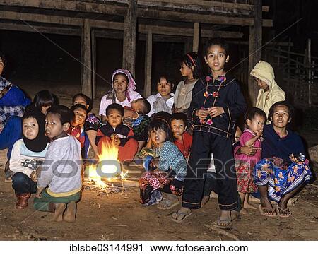 "Lahu children sitting around a campfire in a mountain village, harvest festival, Chiang Rai Province, Northern Thailand, Thailand, Asia" View Large Photo Image Stock Image - "Lahu children sitting around a campfire in a mountain village, harvest festival, Chiang Rai Province, Northern Thailand, Thailand, Asia". Fotosearch