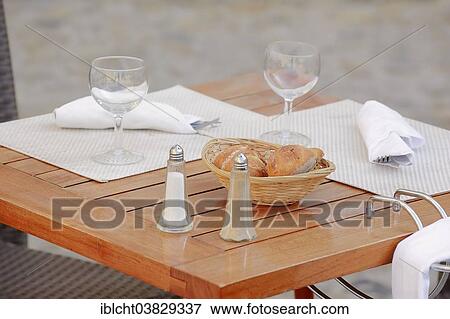 "Laid table at a street cafe, Avignon, Vaucluse, Provence-Alpes-Cote d'Azur, Southern France, France, Europe" View Large Photo Image Stock Photo - "Laid table at a street cafe, Avignon, Vaucluse, Provence-Alpes-Cote d'Azur, Southern France, France, Europe". Fotosearch