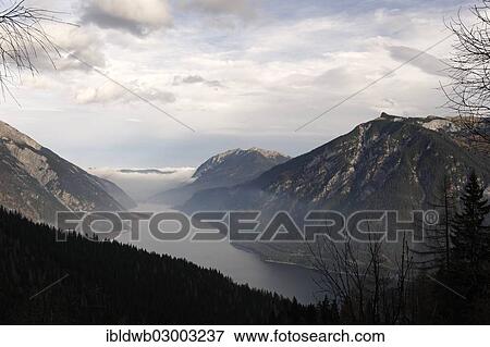 "Lake Achen seen from the Baerenbadalm, Lake Achen region, Karwendel mountain range, Karwendel Mountains, near Pertisau, Tyrol, Austria, Europe" View Large Photo Image Stock Photo - "Lake Achen seen from the Baerenbadalm, Lake Achen region, Karwendel mountain range, Karwendel Mountains, near Pertisau, Tyrol, Austria, Europe". Fotosearch