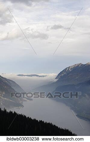 "Lake Achen seen from the Baerenbadalm, Lake Achen region, Karwendel mountain range, Karwendel Mountains, near Pertisau, Tyrol, Austria, Europe" View Large Photo Image Stock Photo - "Lake Achen seen from the Baerenbadalm, Lake Achen region, Karwendel mountain range, Karwendel Mountains, near Pertisau, Tyrol, Austria, Europe". Fotosearch