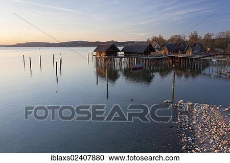 "Lake dwellings, Pfahlbaumuseum Unteruhldingen open air museum in the evening light, a UNESCO World Heritage Site, Lake Constance, Bodenseekreis district, Baden-Wuerttemberg, Germany, Europe, PublicGround, Europe" View Large Photo Image Stock Image - "Lake dwellings, Pfahlbaumuseum Unteruhldingen open air museum in the evening light, a UNESCO World Heritage Site, Lake Constance, Bodenseekreis district, Baden-Wuerttemberg, Germany, Europe, PublicGround, Europe". Fotosearch