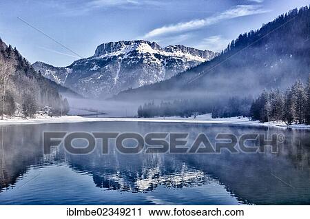 "Lake Pillersee in winter, Steinplatte mountain at the back, near Waidring, Tyrol, Austria, Europe" View Large Photo Image Stock Image - "Lake Pillersee in winter, Steinplatte mountain at the back, near Waidring, Tyrol, Austria, Europe". Fotosearch
