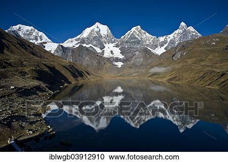 "Lake Qarwaqucha in the morning, the mountains Siula Grande, left, Yerupaja Grande, Yerupaja Chico and Jirishanca, right, Cordillera Huayhuash mountain range, Andes, northern Peru, Peru, South America" View Large Photo Image Stock Image - "Lake Qarwaqucha in the morning, the mountains Siula Grande, left, Yerupaja Grande, Yerupaja Chico and Jirishanca, right, Cordillera Huayhuash mountain range, Andes, northern Peru, Peru, South America". Fotosearch