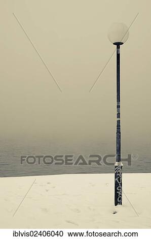 "Lamp post in fog, winter" View Large Photo Image Stock Image - "Lamp post in fog, winter". Fotosearch
