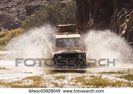"Land Rover during a water crossing, Puros, Kaokoland, Namibia, Africa" View Large Photo Image Stock Photo - "Land Rover during a water crossing, Puros, Kaokoland, Namibia, Africa". Fotosearch
