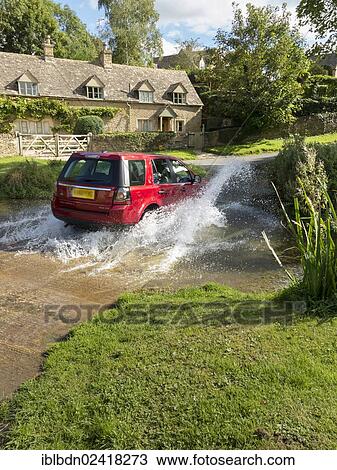 Land rover Freelander crossing a stream, Cotswolds, England, United Kingdom, Europe View Large Photo Image Stock Image - Land rover Freelander crossing a stream, Cotswolds, England, United Kingdom, Europe. Fotosearch