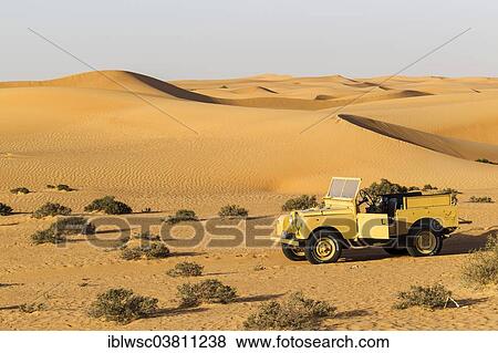 "Land rover from the 50s before sand dunes, desert safari, Dubai, United Arab Emirates, Asia" View Large Photo Image Stock Photo - "Land rover from the 50s before sand dunes, desert safari, Dubai, United Arab Emirates, Asia". Fotosearch