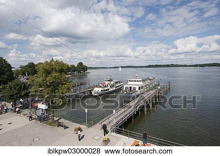 "Landing stage with a steamboat on lake Chiemsee, Insel Herrenchiemsee, Prien am Chiemsee, Bavaria, Germany, Europe" View Large Photo Image Stock Photo - "Landing stage with a steamboat on lake Chiemsee, Insel Herrenchiemsee, Prien am Chiemsee, Bavaria, Germany, Europe". Fotosearch