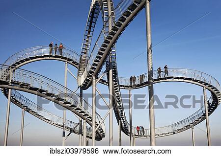 "Landmark Tiger & Turtle - Magic Mountain, walk-in sculpture, Anger Park, Duisburg, North Rhine-Westphalia, Germany, Europe" View Large Photo Image Stock Photograph - "Landmark Tiger & Turtle - Magic Mountain, walk-in sculpture, Anger Park, Duisburg, North Rhine-Westphalia, Germany, Europe". Fotosearch