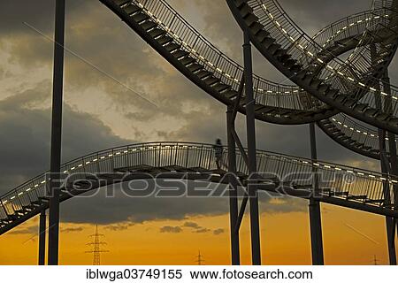 "Landmark """"Tiger & Turtle Magic Mountain"""" by Heike Mutter and Ulrich Genth, walk-in sculpture in the shape of a roller coaster, on the Heinrich-Hildebrand-Hoehe slag heap, Duisburg, Ruhr district, North Rhine-Westphalia, Germany, Europe" View Large Photo Image Stock Photography - "Landmark """"Tiger & Turtle Magic Mountain"""" by Heike Mutter and Ulrich Genth, walk-in sculpture in the shape of a roller coaster, on the Heinrich-Hildebrand-Hoehe slag heap, Duisburg, Ruhr district, North Rhine-Westphalia, Germany, Europe". Fotosearch