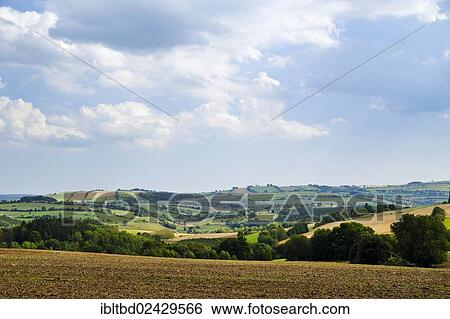 "Landscape near the town of Thermalbad Wiesenbad as seen from Freiberger Strasse street, Ore Mountains, Saxony, Germany, Europe" View Large Photo Image Stock Photograph - "Landscape near the town of Thermalbad Wiesenbad as seen from Freiberger Strasse street, Ore Mountains, Saxony, Germany, Europe". Fotosearch
