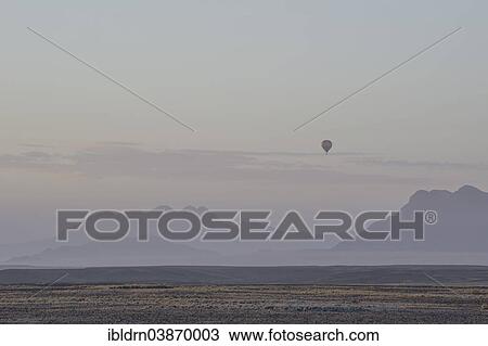 "Landscape of the Namib Desert with a hot air balloon, Sesriem, Hardap Region, Namibia, Africa" View Large Photo Image Stock Image - "Landscape of the Namib Desert with a hot air balloon, Sesriem, Hardap Region, Namibia, Africa". Fotosearch