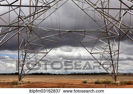 "Landscape with high tension pylons, Western Australia" View Large Photo Image Stock Photo - "Landscape with high tension pylons, Western Australia". Fotosearch