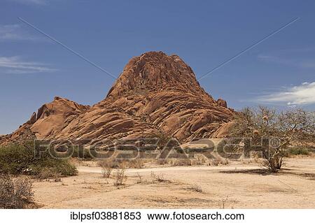"Landscape with rocks around the monadnock of Spitzkoppe Mountain, Namibia, Africa" View Large Photo Image Stock Image - "Landscape with rocks around the monadnock of Spitzkoppe Mountain, Namibia, Africa". Fotosearch
