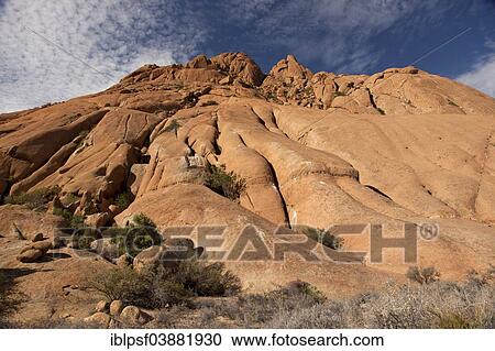 "Landscape with rocks around the monadnock of Spitzkoppe Mountain, Namibia, Africa" View Large Photo Image Stock Image - "Landscape with rocks around the monadnock of Spitzkoppe Mountain, Namibia, Africa". Fotosearch