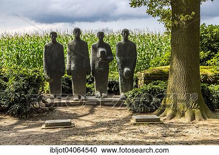 "Langemark German war cemetery with monument """"Grieving Soldiers"""" by Emil Krieger, Langemark, West Flanders, Flanders, Belgium, Europe" View Large Photo Image Stock Image - "Langemark German war cemetery with monument """"Grieving Soldiers"""" by Emil Krieger, Langemark, West Flanders, Flanders, Belgium, Europe". Fotosearch