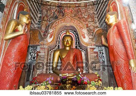 Stock Photography - "Large brightly painted golden Buddha figure, posture of meditation, Dhyana Mudra, Lankatilaka Vihara Temple, near Kandy, Central Province, Sri Lanka, Asia". Fotosearch