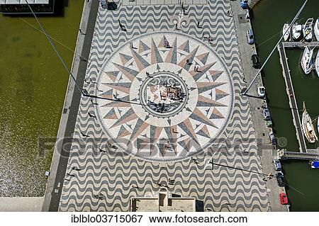 "Large compass in the paving in front of the Monumento a Los Descubrimientos, Monument to the Discoveries, Belem, Lisbon, Lisbon District, Portugal, Europe" View Large Photo Image Stock Photo - "Large compass in the paving in front of the Monumento a Los Descubrimientos, Monument to the Discoveries, Belem, Lisbon, Lisbon District, Portugal, Europe". Fotosearch