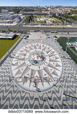 "Large compass in the paving in front of the Monumento a Los Descubrimientos, Monument to the Discoveries, Belem, Lisbon, Lisbon District, Portugal, Europe" View Large Photo Image Stock Photo - "Large compass in the paving in front of the Monumento a Los Descubrimientos, Monument to the Discoveries, Belem, Lisbon, Lisbon District, Portugal, Europe". Fotosearch