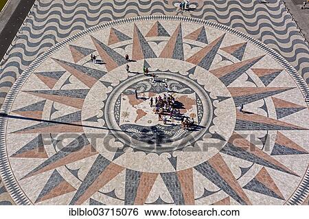 Stock Photograph - "Large compass in the paving in front of the Monumento a Los Descubrimientos, Monument to the Discoveries, Belem, Lisbon, Lisbon District, Portugal, Europe". Fotosearch