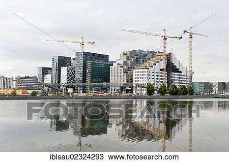 "Large construction site, modern office buildings, reflection in the lake, Opera Quarter, Oslo, Norway, Scandinavia, Northern Europe, Europe" View Large Photo Image Stock Image - "Large construction site, modern office buildings, reflection in the lake, Opera Quarter, Oslo, Norway, Scandinavia, Northern Europe, Europe". Fotosearch
