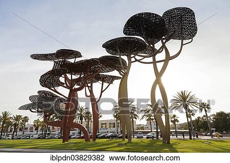 "Large pine tree sculpture on the promenade of La Pineda, Platja de la Pineda, Catalonia, Spain, Europe" View Large Photo Image Stock Image - "Large pine tree sculpture on the promenade of La Pineda, Platja de la Pineda, Catalonia, Spain, Europe". Fotosearch