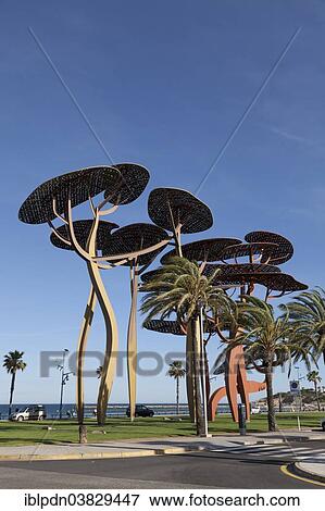 "Large pine tree sculpture on the promenade of La Pineda, Platja de la Pineda, Catalonia, Spain, Europe" View Large Photo Image Stock Photo - "Large pine tree sculpture on the promenade of La Pineda, Platja de la Pineda, Catalonia, Spain, Europe". Fotosearch