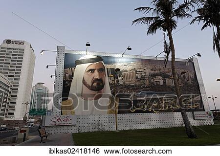 Large poster with a portrait of Mohammed bin Rashid al Maktoum, ruler of Dubai, United Arab Emirates, Middle East, Asia View Large Photo Image Stock Photograph - Large poster with a portrait of Mohammed bin Rashid al Maktoum, ruler of Dubai, United Arab Emirates, Middle East, Asia. Fotosearch