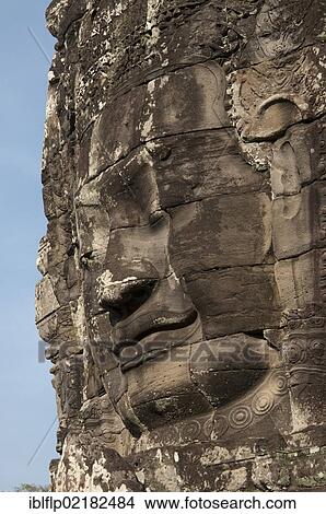 Picture - "Large sculpture of head on tower of Khmer temple, Bayon, Angkor Thom, Siem Reap, Cambodia, Southeast Asia, Asia". Fotosearch