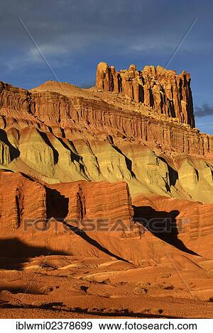 "Last daylight at The Castle Rock, sunset after a thunderstorm, Capitol Reef National Park, Utah, Southwestern USA, USA" View Large Photo Image Stock Photo - "Last daylight at The Castle Rock, sunset after a thunderstorm, Capitol Reef National Park, Utah, Southwestern USA, USA". Fotosearch