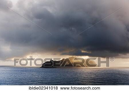 "Last evening sun rays over the island of Mykines in the North Atlantic, Faroe Islands, North Sea, Northern Europe, Europe" View Large Photo Image Stock Photo - "Last evening sun rays over the island of Mykines in the North Atlantic, Faroe Islands, North Sea, Northern Europe, Europe". Fotosearch