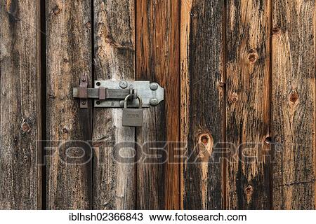 "Latch on a weathered wooden wall, PublicGround" View Large Photo Image Stock Image - "Latch on a weathered wooden wall, PublicGround". Fotosearch