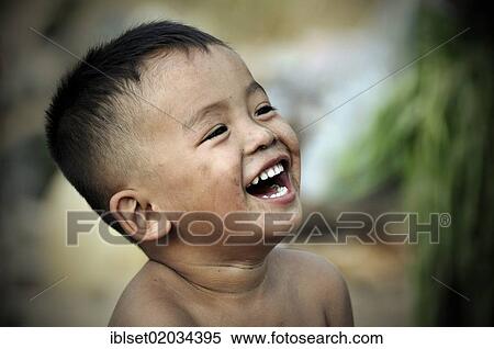 "Laughing boy in Cambodia, Southeast Asia, Asia" View Large Photo Image Stock Photography - "Laughing boy in Cambodia, Southeast Asia, Asia". Fotosearch