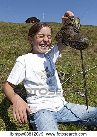 "Laughing girl, 8 years, after stepping into a cow pat, Alp Gun, Safien Valley, Graubunden, Switzerland, Europe" View Large Photo Image Stock Image - "Laughing girl, 8 years, after stepping into a cow pat, Alp Gun, Safien Valley, Graubunden, Switzerland, Europe". Fotosearch