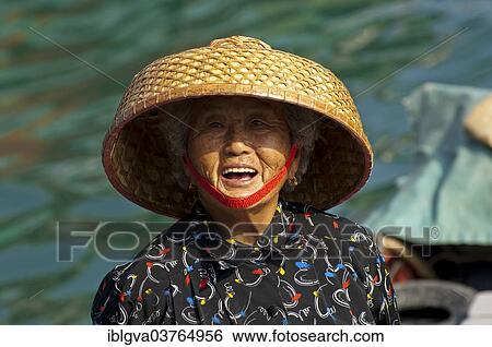 "Laughing old Chinese fishmonger with straw hat, Sai Kung, Hong Kong, China, Asia" View Large Photo Image Stock Photograph - "Laughing old Chinese fishmonger with straw hat, Sai Kung, Hong Kong, China, Asia". Fotosearch