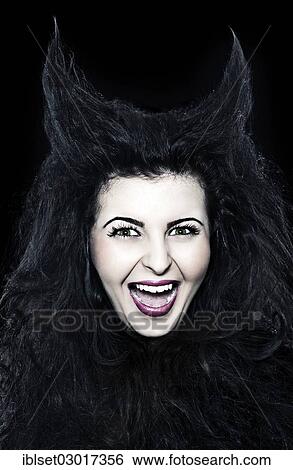 "Laughing young woman dressed as a devil with horns, Austria, Europe" View Large Photo Image Stock Photograph - "Laughing young woman dressed as a devil with horns, Austria, Europe". Fotosearch