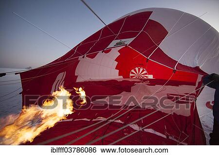 "Launch preparation of a hot air balloon, Sachsenkam, Bavaria, Germany, Europe" View Large Photo Image Stock Photograph - "Launch preparation of a hot air balloon, Sachsenkam, Bavaria, Germany, Europe". Fotosearch