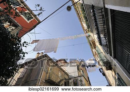 "Laundry hanging on washing lines to dry between houses, Castello, Venice, Venezia, Veneto, Italy, Europe" View Large Photo Image Stock Photo - "Laundry hanging on washing lines to dry between houses, Castello, Venice, Venezia, Veneto, Italy, Europe". Fotosearch