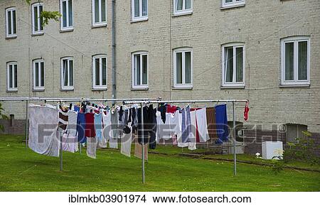 "Laundry hanging outside in front of council flats, Lorick, Dusseldorf, Rhineland, North Rhine-Westphalia, Germany, Europe" View Large Photo Image Picture - "Laundry hanging outside in front of council flats, Lorick, Dusseldorf, Rhineland, North Rhine-Westphalia, Germany, Europe". Fotosearch
