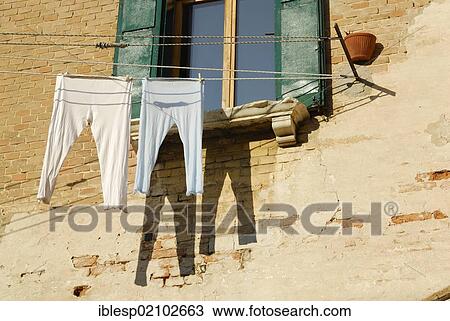 Stock Image - "Laundry on a clothesline, Castello quarter, Venice, Venezia, Veneto, Italy, Europe". Fotosearch