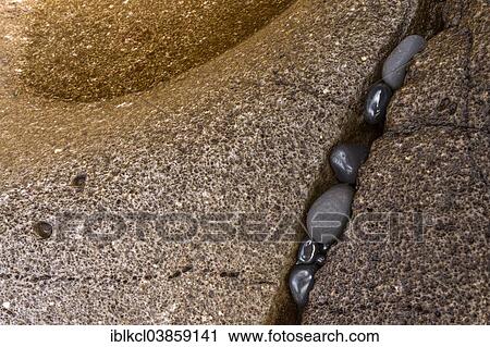 Stock Image - "Lava rock, eroded by ocean surf, detail, Snaefellsnes, Iceland, Europe". Fotosearch