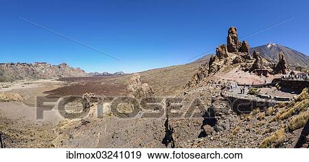 Stock Photo - "Lava rock in Teide National Park, Mount Teide volcano or Pico del Teide on the right, UNESCO World Natural Heritage Site, Vilaflor, Provinz Santa Cruz de Tenerife, Tenerife, Canary Islands, Spain, Europe". Fotosearch