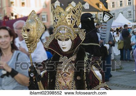 "Lavish Baroque costume and a golden and white mask, Venetian Fair, Ludwigsburg, Baden-Wuerttemberg, Germany, Europe" View Large Photo Image Stock Image - "Lavish Baroque costume and a golden and white mask, Venetian Fair, Ludwigsburg, Baden-Wuerttemberg, Germany, Europe". Fotosearch