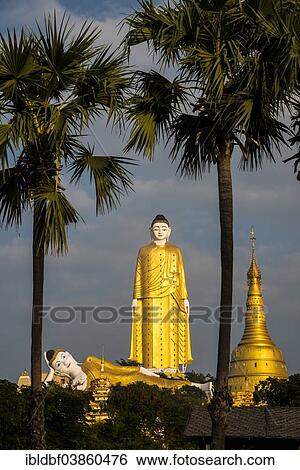 "Lay Kyun Sakkya, standing Buddha, reclining Buddha, statues, and Aung Sakkya Pagoda, Maha Bodhi Ta Htaung monastery, Monywa, Sagaing Division, Myanmar, Asia" View Large Photo Image Stock Photograph - "Lay Kyun Sakkya, standing Buddha, reclining Buddha, statues, and Aung Sakkya Pagoda, Maha Bodhi Ta Htaung monastery, Monywa, Sagaing Division, Myanmar, Asia". Fotosearch