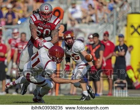 "LB Ramon Azim, No. 50 Austria, making a tackle during a charity game between Team Austria and Claremont McKenna College, Hohe Warte stadium in Vienna, Austria, Europe" View Large Photo Image Stock Photography - "LB Ramon Azim, No. 50 Austria, making a tackle during a charity game between Team Austria and Claremont McKenna College, Hohe Warte stadium in Vienna, Austria, Europe". Fotosearch