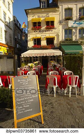 "Le Corsaire restaurant with terrace tables set ready for lunch, Honfleur, Normandy, France, Europe" View Large Photo Image Stock Image - "Le Corsaire restaurant with terrace tables set ready for lunch, Honfleur, Normandy, France, Europe". Fotosearch