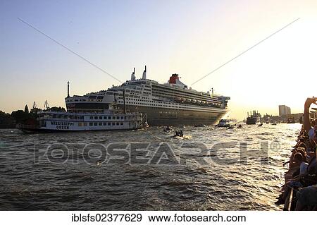 "Leaving cruise ship Queen Mary 2 in the evening back light, Cruise Days 17, - 19. 08. 2012, Port of Hamburg, Hamburg, Germany, Europe" View Large Photo Image Stock Photo - "Leaving cruise ship Queen Mary 2 in the evening back light, Cruise Days 17, - 19. 08. 2012, Port of Hamburg, Hamburg, Germany, Europe". Fotosearch