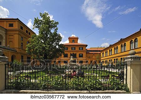 Stock Image - "Lehnbachhaus with gardens and a fountain, fence at the front, Munchen, Upper Bavaria, Bavaria, Germany, Europe". Fotosearch