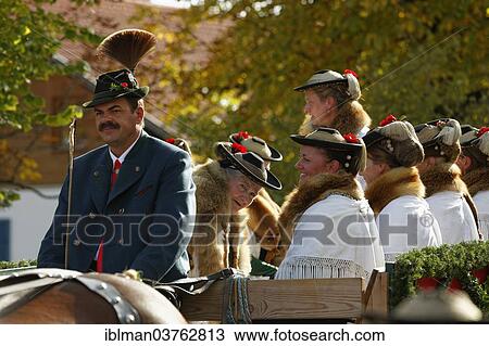 "Leonhardiritt procession, horse-drawn carriage with women wearing traditional costume, Wildsteig, Pfaffenwinkel region, Upper Bavaria, Bavaria, Germany, Europe" View Large Photo Image Stock Image - "Leonhardiritt procession, horse-drawn carriage with women wearing traditional costume, Wildsteig, Pfaffenwinkel region, Upper Bavaria, Bavaria, Germany, Europe". Fotosearch
